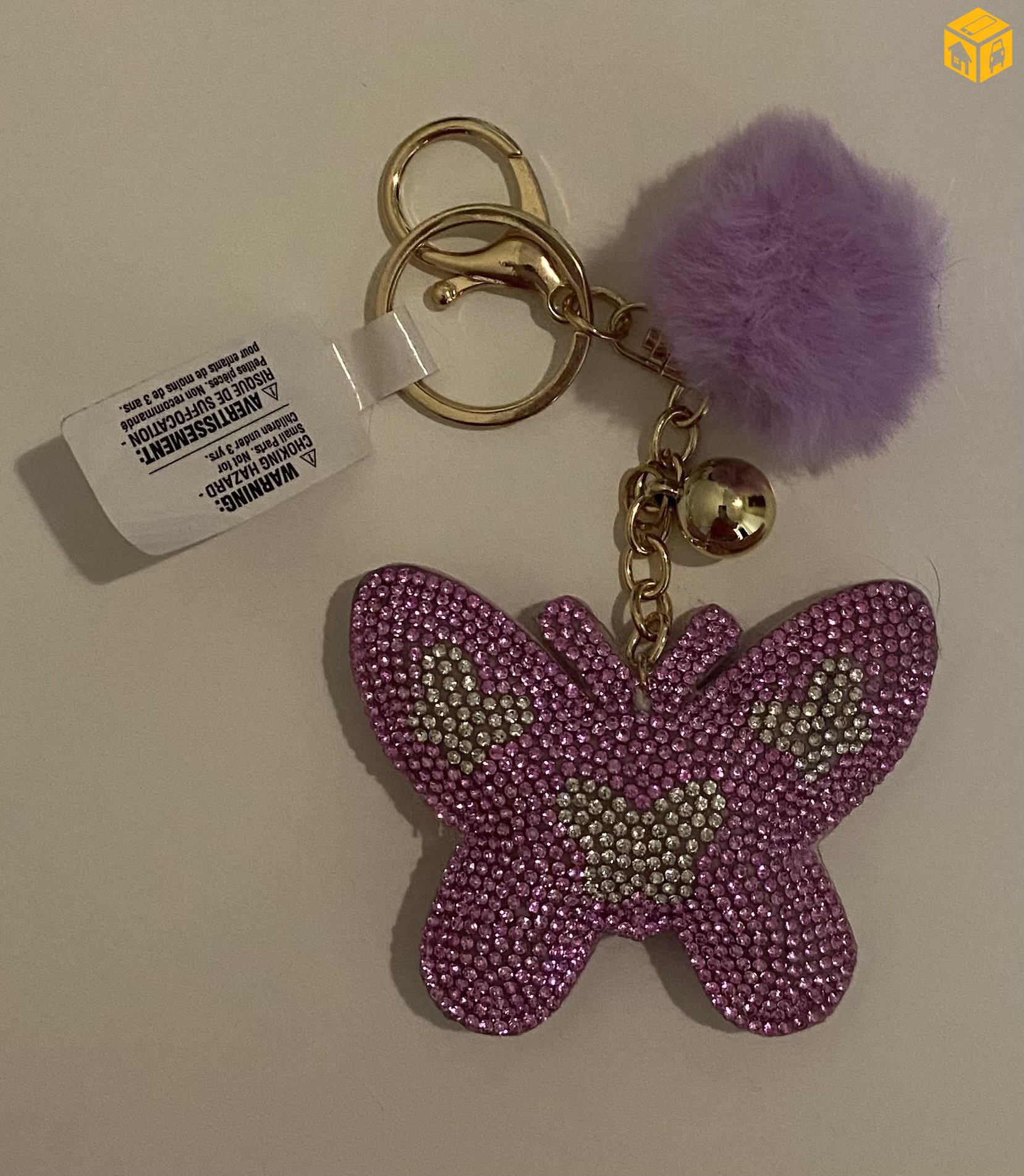 Цүнхний гоёл, түлхүүрийн оосортой.